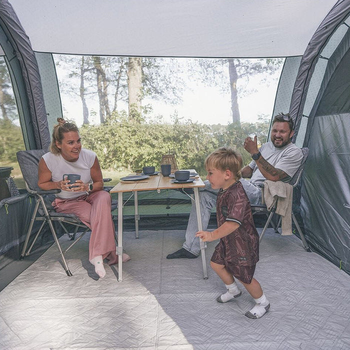 Family inside an Outwell inflatable air tent
