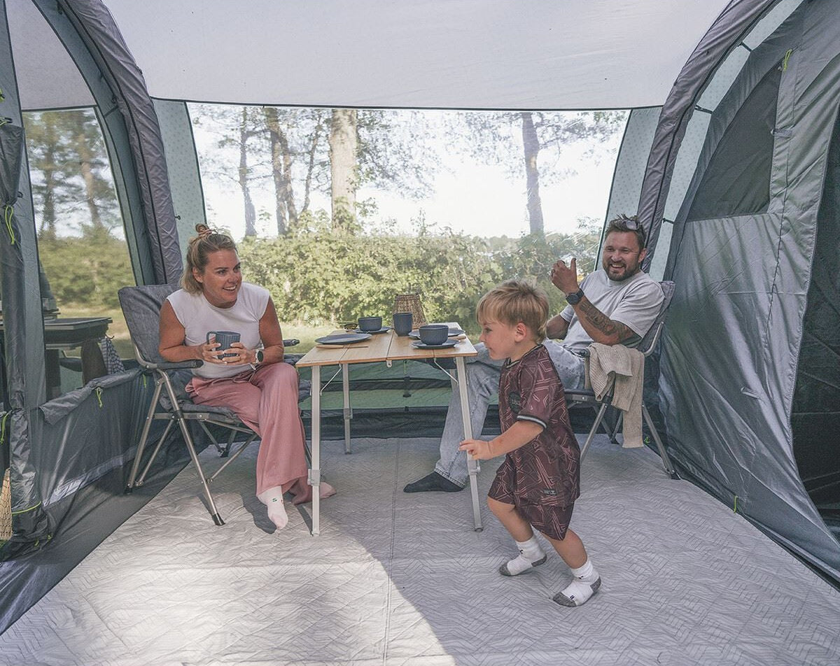 Family inside an Outwell inflatable air tent