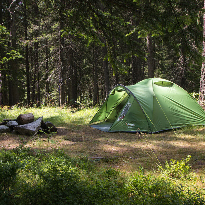 Vango GO tent pitched in forest sunshine, ideal for solo or two-person camping