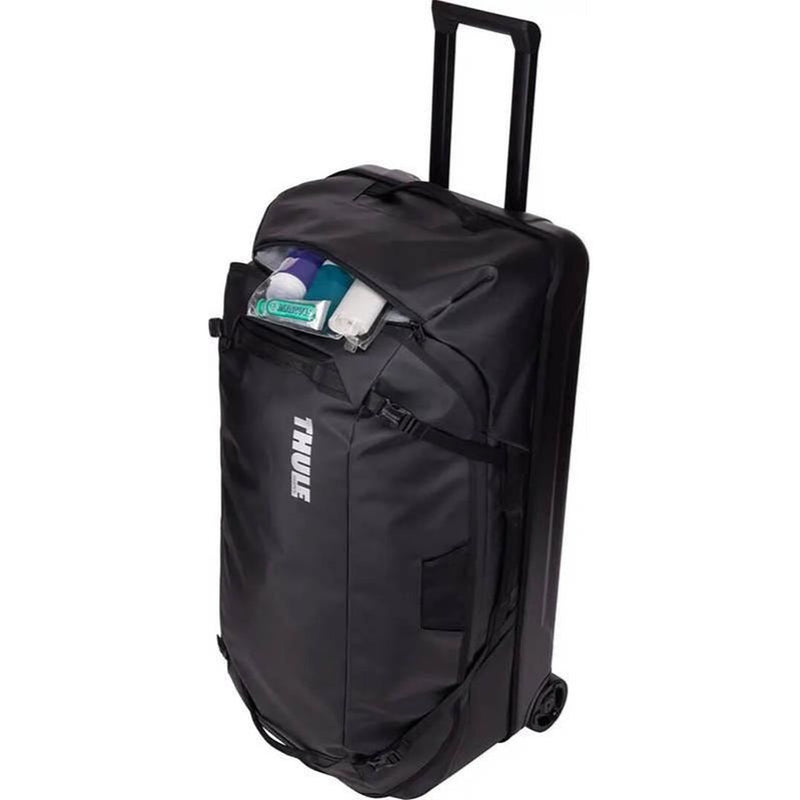 Thule Chasm check 110l in wheeled duffel suitcase black Thule - UK Camping And Leisure