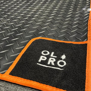 Olpro Awning Tunnel Mat 1500mm x 800mm Black Rubber checker board with Orange Edge Trim Olpro - UK Camping And Leisure