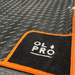 Olpro Awning Tunnel Mat 1500mm x 800mm Black Rubber checker board with Orange Edge Trim Olpro - UK Camping And Leisure